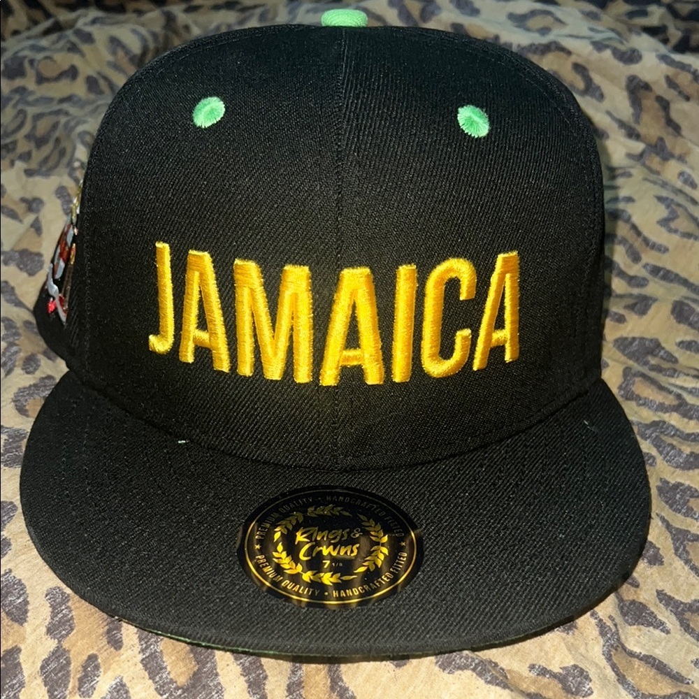 NWT Jamaica Black and Gold Snapback Hat size: 7 1/8